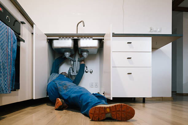 Professional Emergency Plumber technician working in Badger, CA